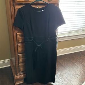 NWT Calvin Klein black dress with gold zipper.